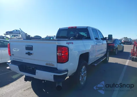 2015 Chevrolet Silverado 2500Hd High Country z USA, uszkodzony, nr VIN 1GC1KXE85FF613999